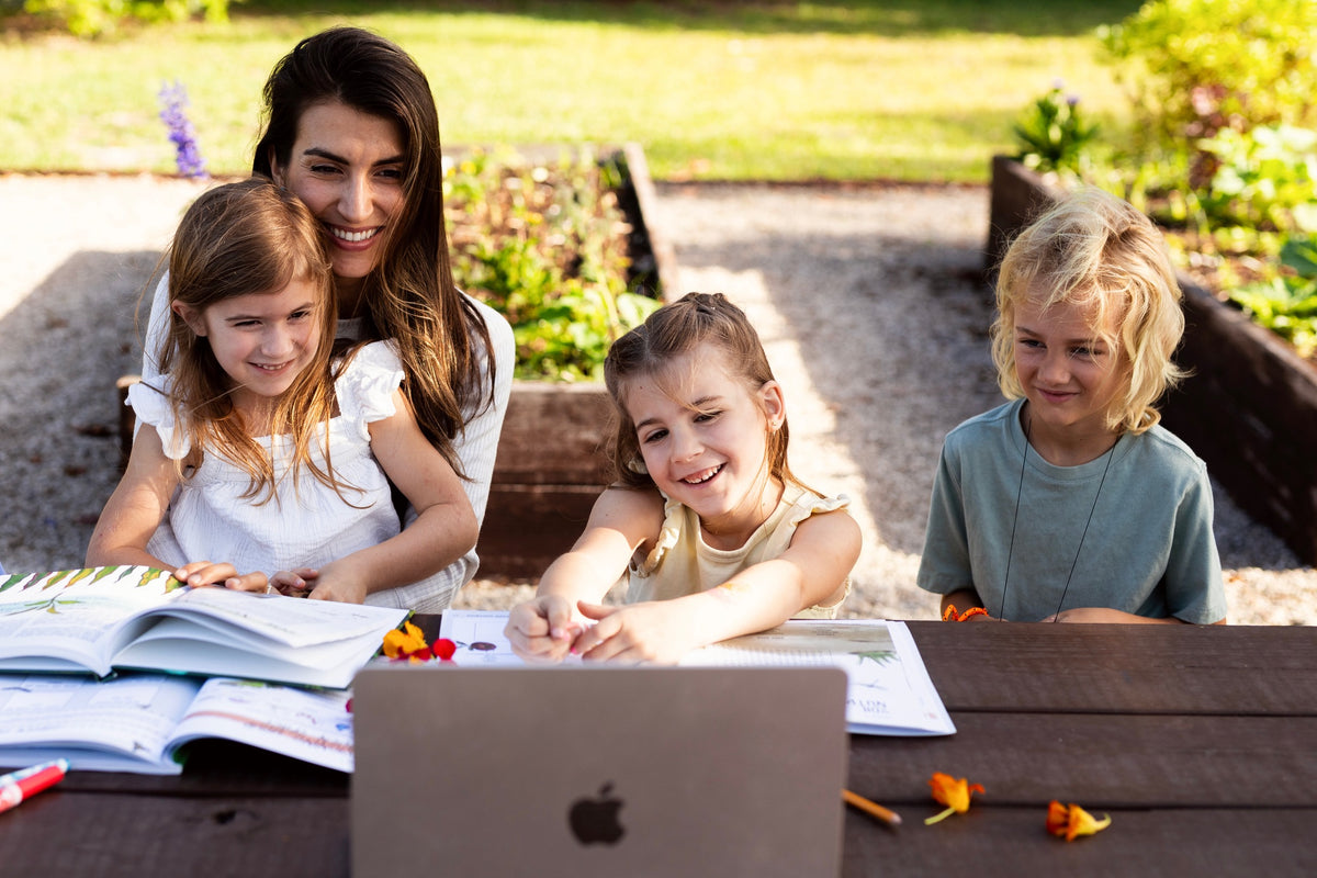 30 video lessons playing on a laptop